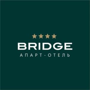 Товарный знак №1073779, принадлежит организации ОБЩЕСТВО С ОГРАНИЧЕННОЙ ОТВЕТСТВЕННОСТЬЮ "АПАРТ-ОТЕЛЬ "БРИДЖ", ОГРН 1232300057098, ИНН 2367033597